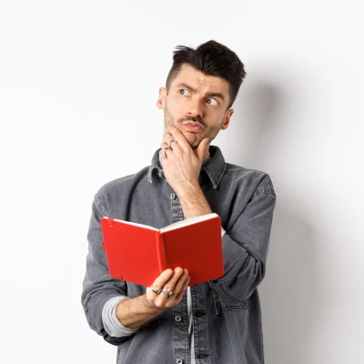 young-man-looking-away-against-white-background_1048944-8813358